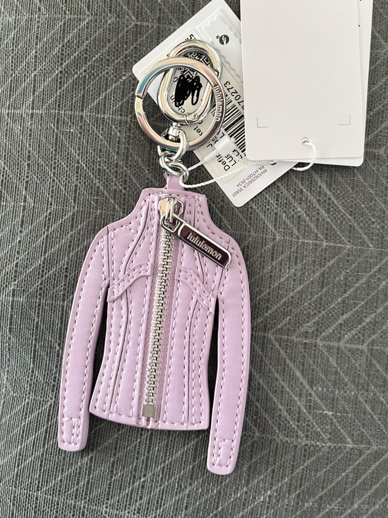 lululemon athletica Handbags - NWT Lululemon Lilac Scuba Jacket Keychain Accessory with Silver Hardware